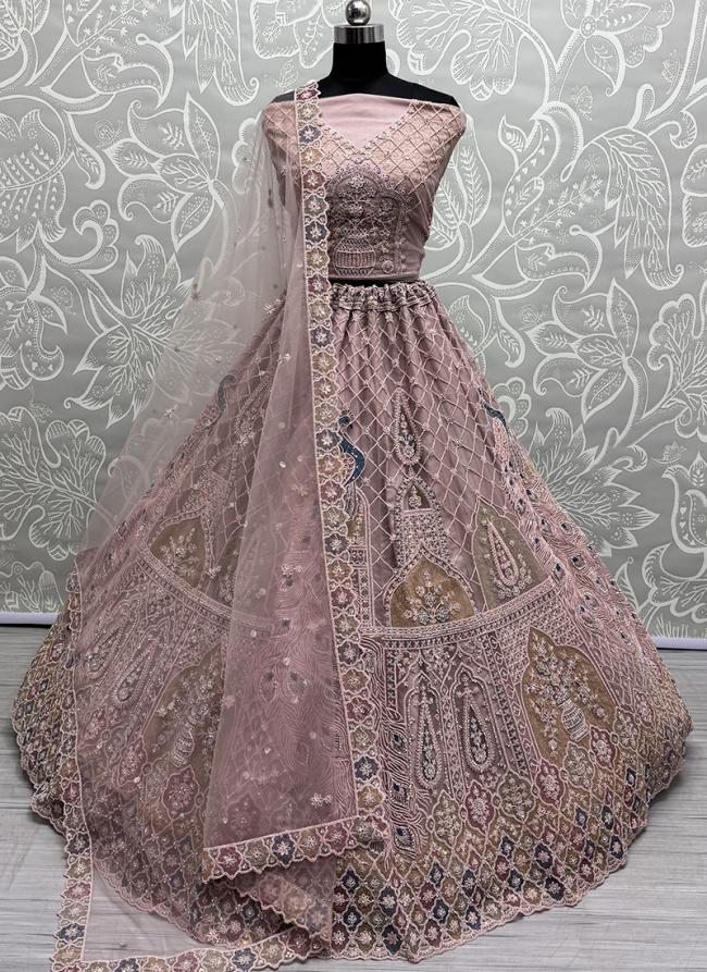 Net Peach Bridal Wear Embroidery Work Lehenga Choli